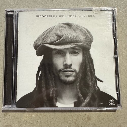 JP COOPER - RAISED UNDER GREY SKIES (CD ALBUM)